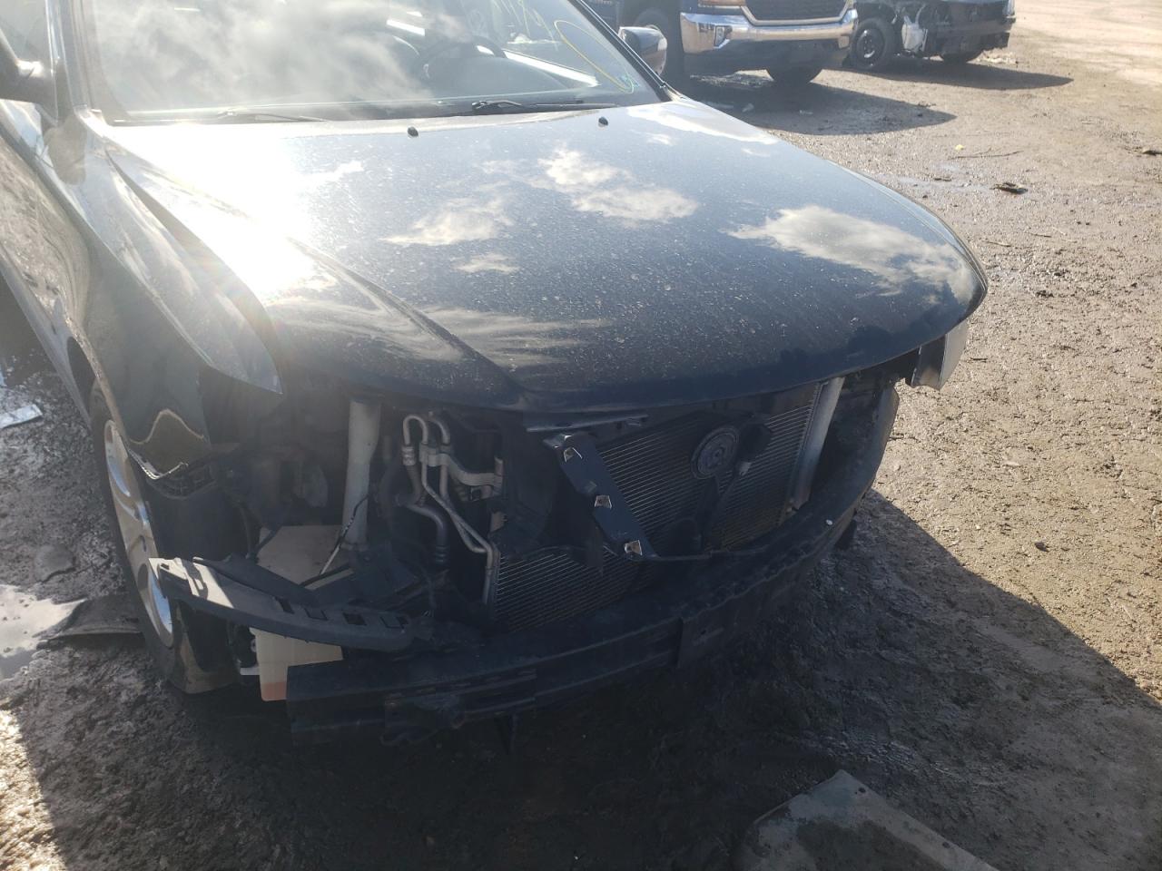 Photo 9 from auction – 2009 KIA OPTIMA LX with VIN KNAGE228295335336
