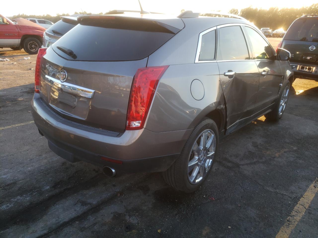 Photo 4 from auction – 2011 CADILLAC SRX PERFOR with VIN 3GYFNBEY3BS571865