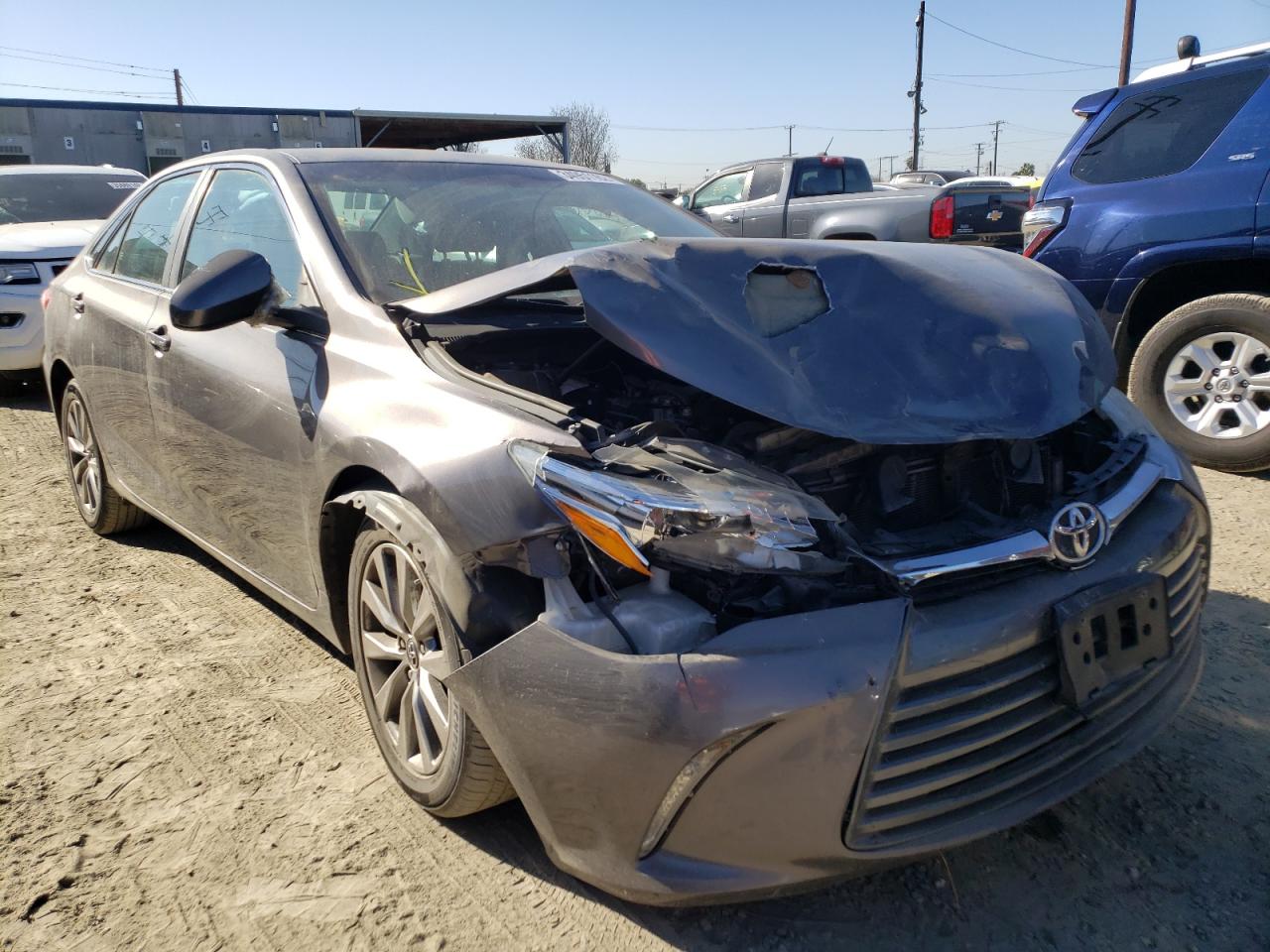 TOYOTA CAMRY LE 2016 with VIN 4T4BF1FK8GR560438 - Photo from auction