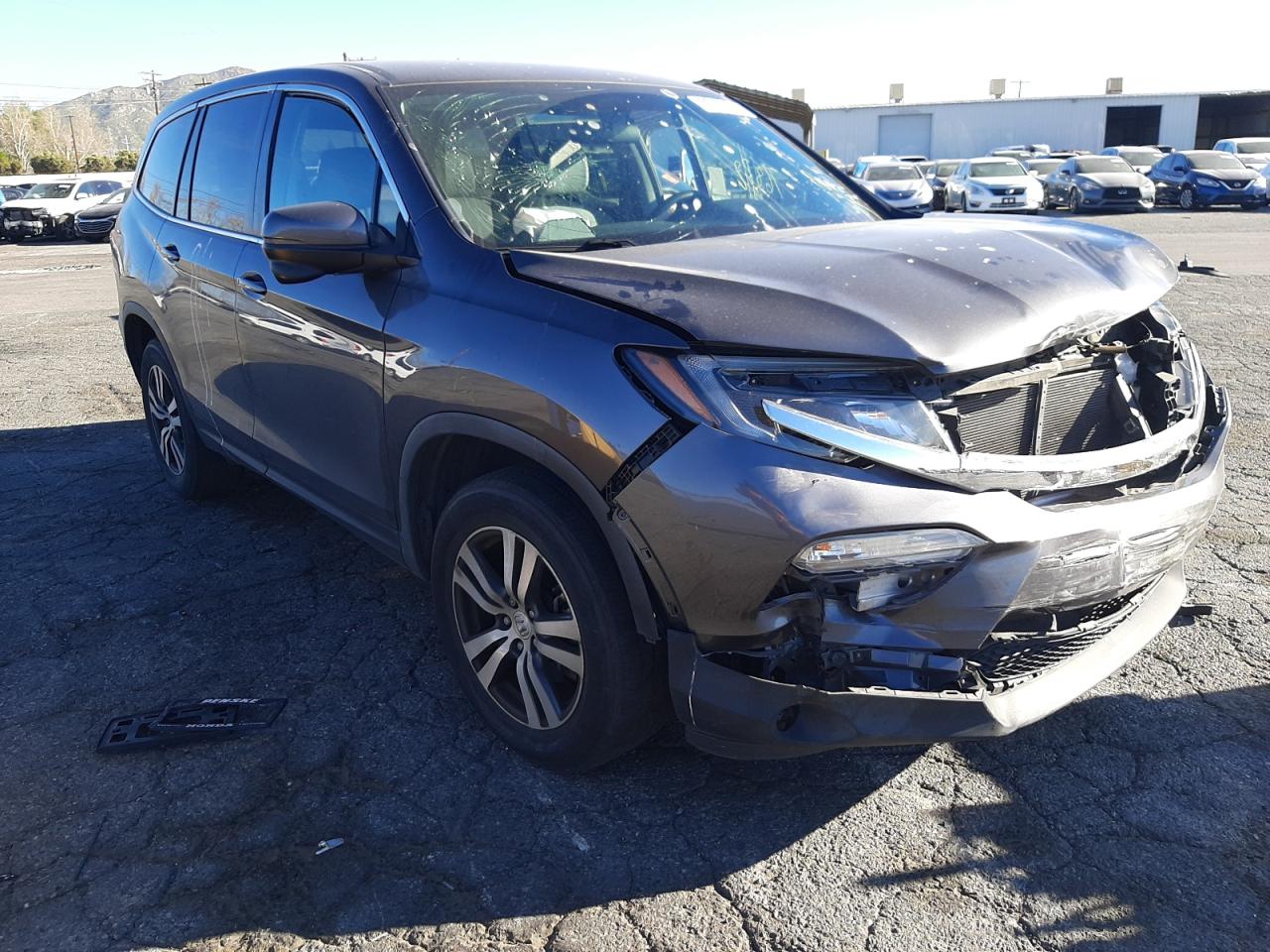 HONDA PILOT EX 2017 with VIN 5FNYF5H32HB028621 - Photo from auction