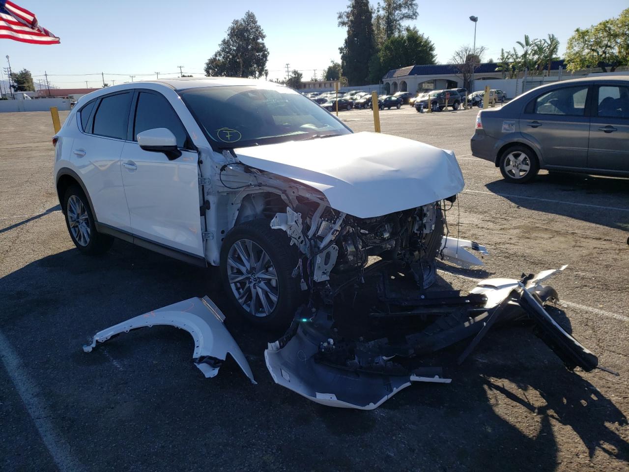 MAZDA CX-5 GRAND 2021 with VIN JM3KFADM0M1303765 - Photo from auction