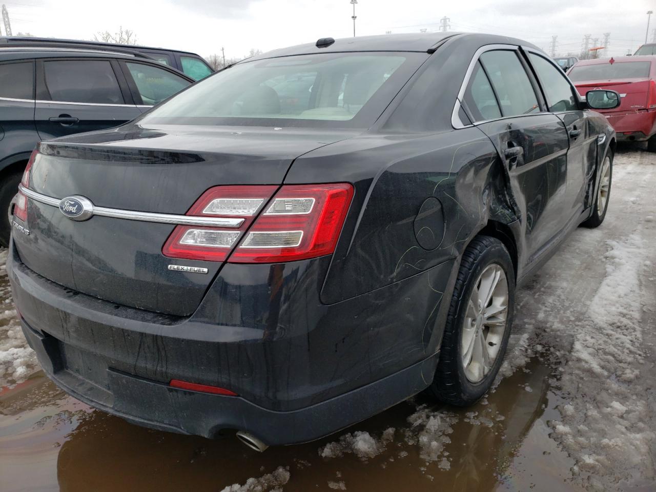 Photo 4 from auction – 2015 FORD TAURUS SE with VIN 1FAHP2D85FG130243