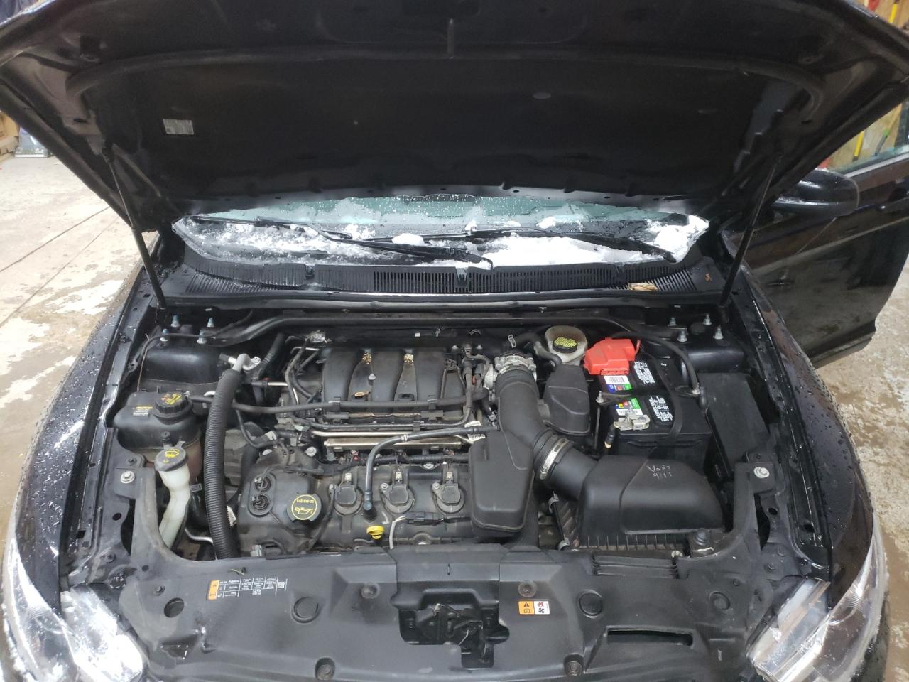 Photo 7 from auction – 2016 FORD TAURUS SEL with VIN 1FAHP2H81GG147052