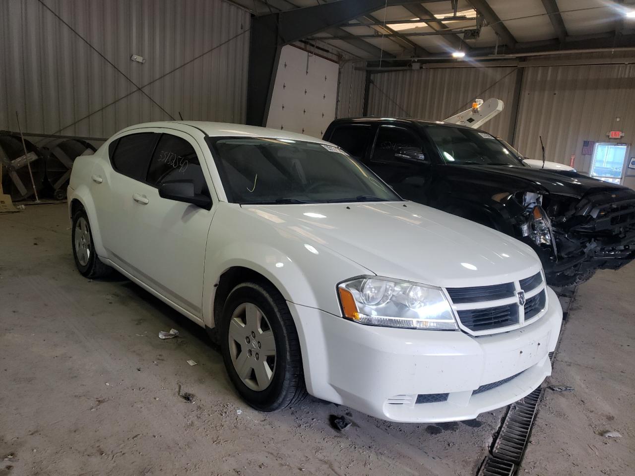 DODGE AVENGER 2009 with VIN 1B3LC46D59N550396 - Photo from auction