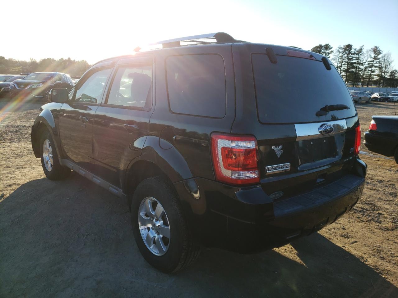 Photo 3 from auction – 2011 FORD ESCAPE LIM with VIN 1FMCU9EG5BKB29754