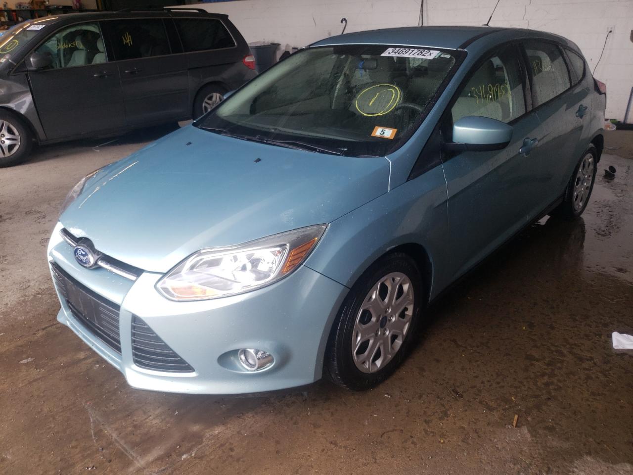 Photo 2 from auction – 2012 FORD FOCUS SE with VIN 1FAHP3K25CL326979