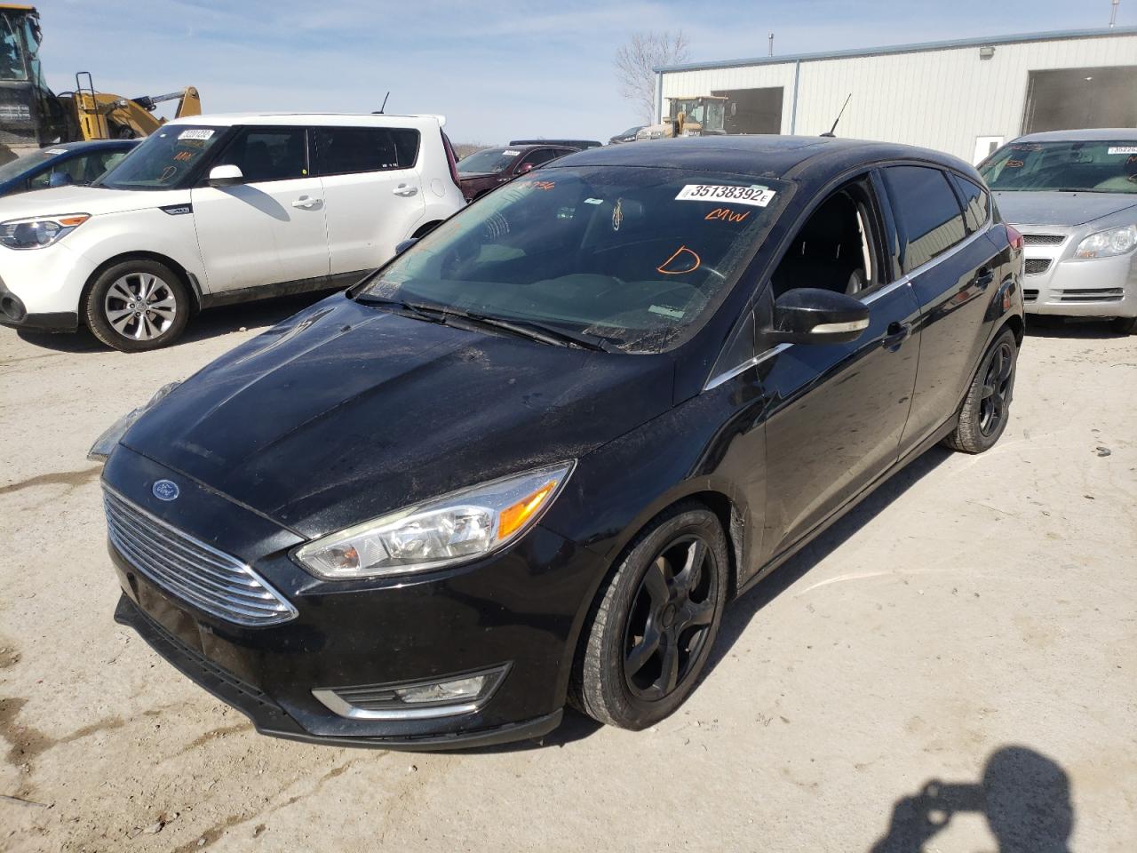 Photo 2 from auction – 2015 FORD FOCUS TITA with VIN 1FADP3N21FL379936