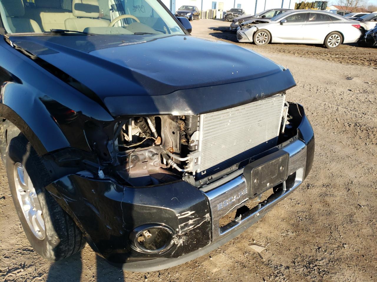 Photo 9 from auction – 2011 FORD ESCAPE LIM with VIN 1FMCU9EG5BKB29754