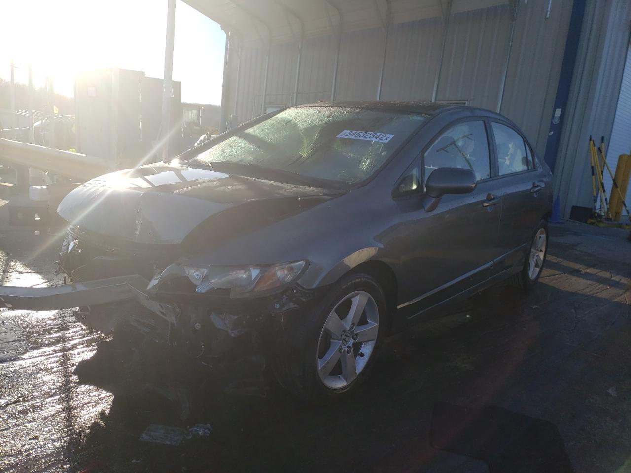 Photo 2 from auction – 2011 HONDA CIVIC LX with VIN 19XFA1F55BE021341