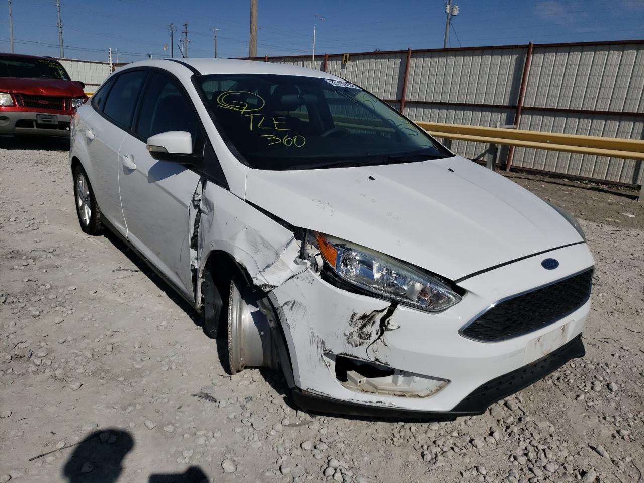 FORD FOCUS SE 2016 with VIN 1FADP3F20GL267452 - Photo from auction