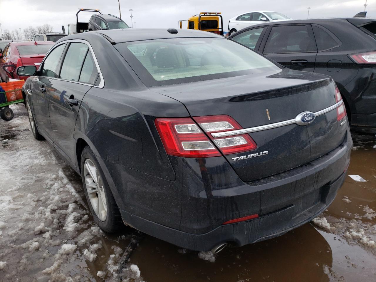 Photo 3 from auction – 2015 FORD TAURUS SE with VIN 1FAHP2D85FG130243
