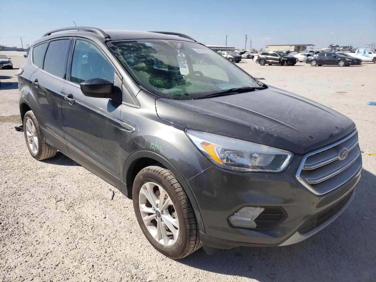 FORD ESCAPE SE 2018 with VIN 1FMCU9GD3JUA66417 - Photo from auction
