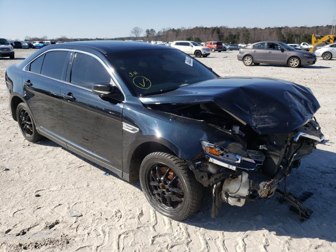 FORD TAURUS SEL 2014 with VIN 1FAHP2E86EG145931 - Photo from auction