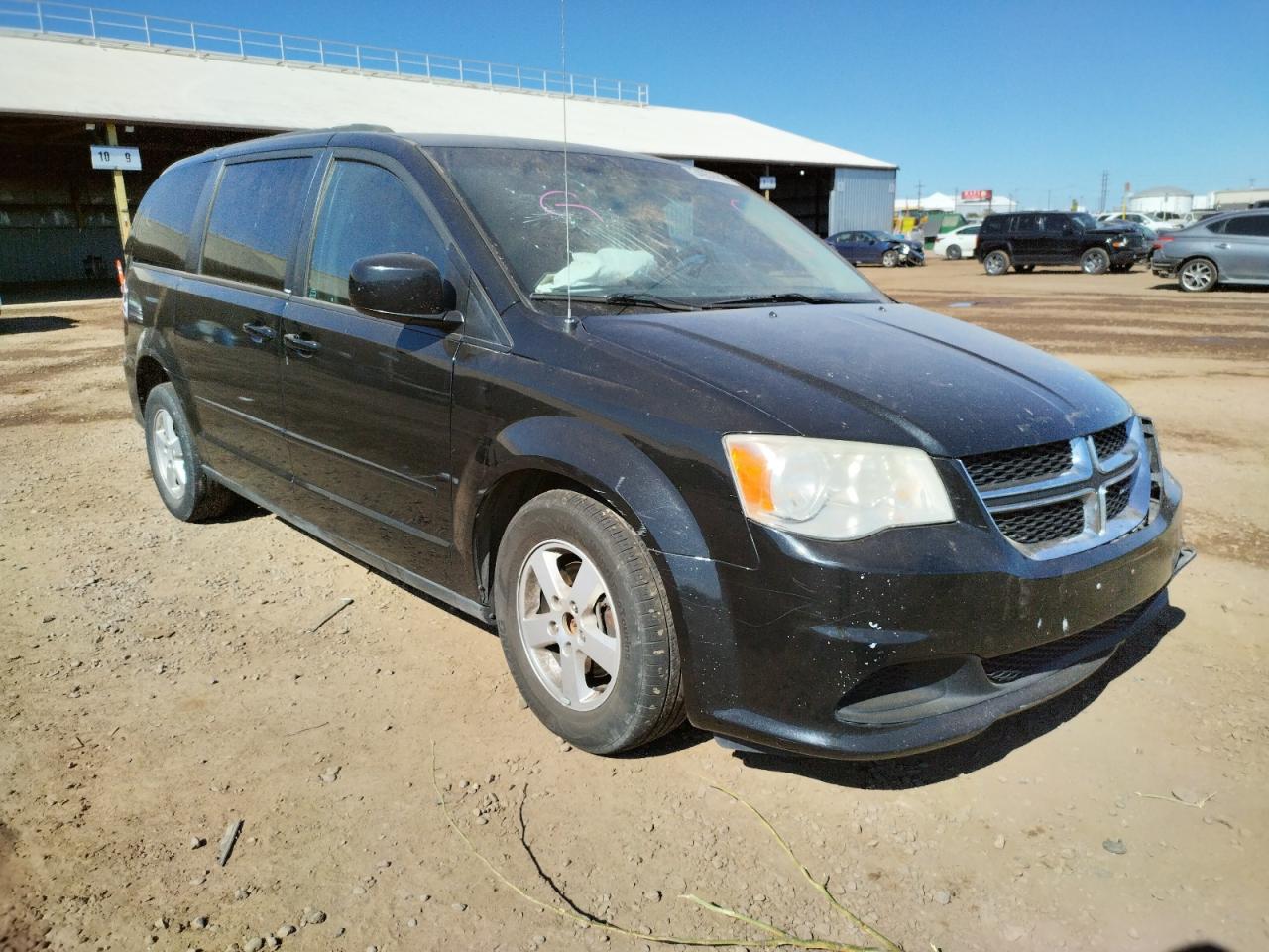 DODGE GRAND CARA 2012 with VIN 2C4RDGCG0CR130724 - Photo from auction
