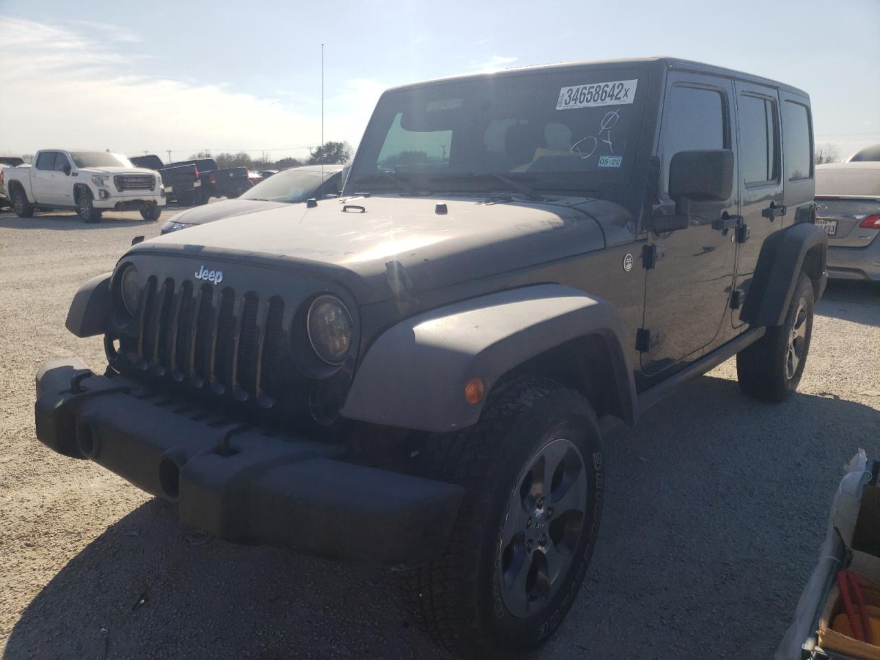 Photo 2 from auction – 2014 JEEP WRANGLER U with VIN 1C4BJWFGXEL234939