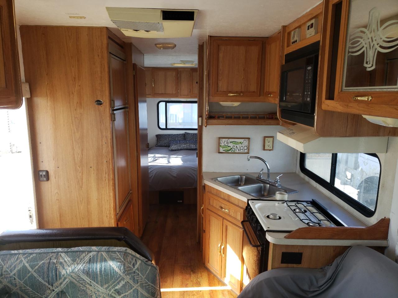 Photo 9 from auction – 2000 COACH CATALINA with VIN 1FDXE45S7YHA93139