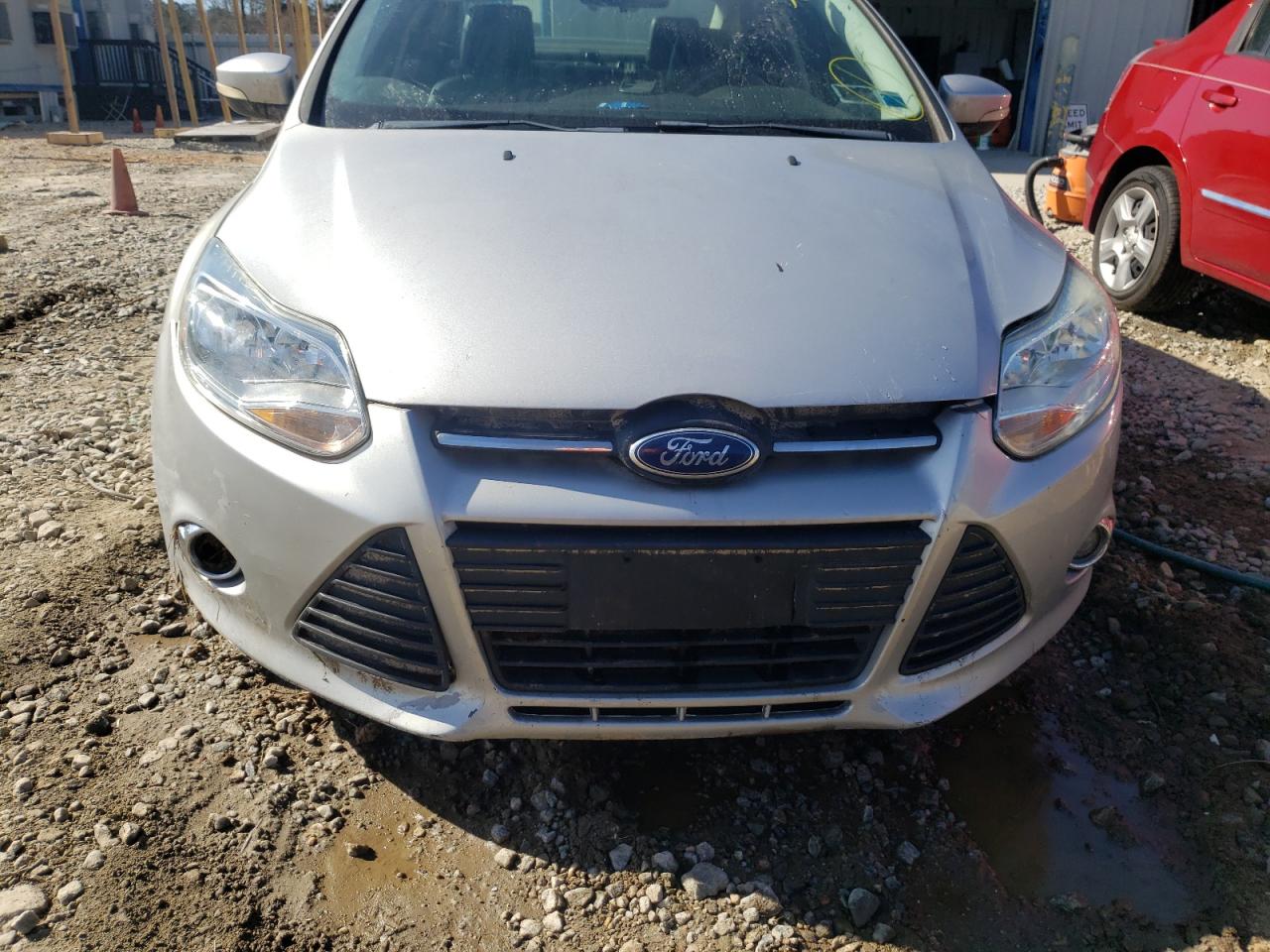 Foto 9 de la subasta – 2014 FORD FOCUS SE con VIN 1FADP3F23EL319718