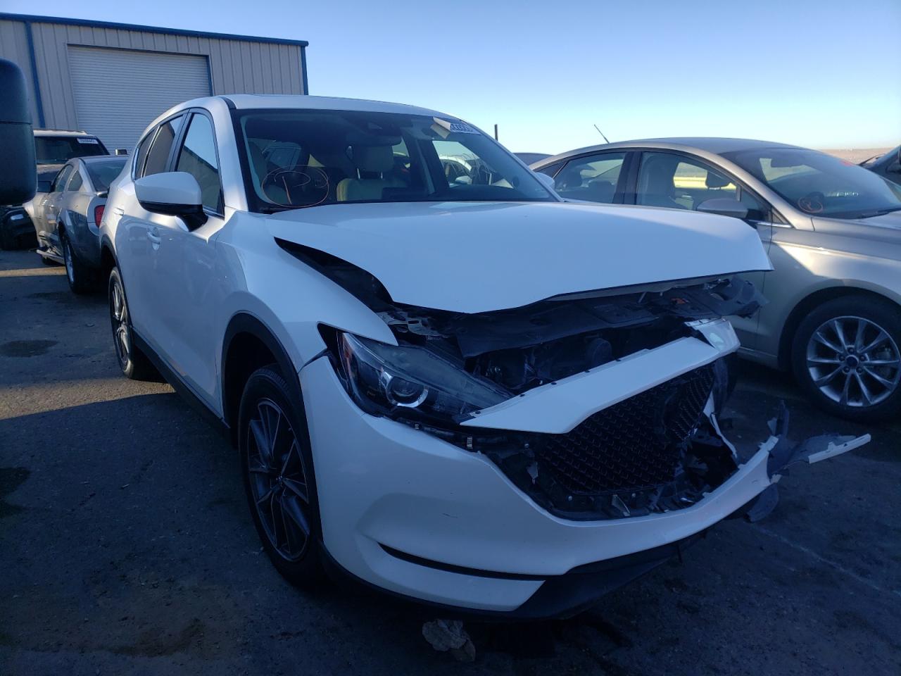 MAZDA CX-5 TOURI 2018 with VIN JM3KFBCMXJ0469252 - Photo from auction