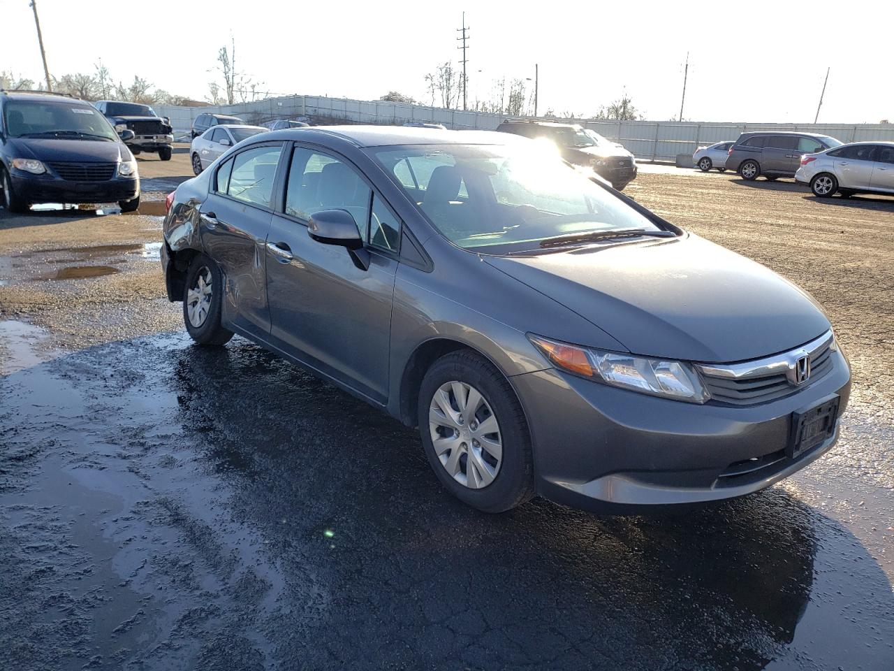 HONDA CIVIC LX 2012 with VIN 2HGFB2F58CH563172 - Photo from auction