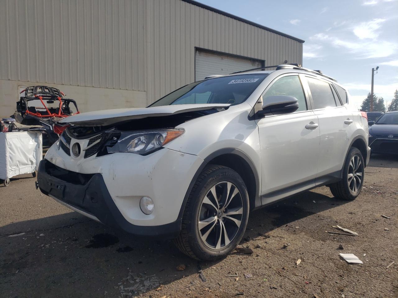 Photo 2 from auction – 2015 TOYOTA RAV4 LIMIT with VIN 2T3DFREV1FW336527