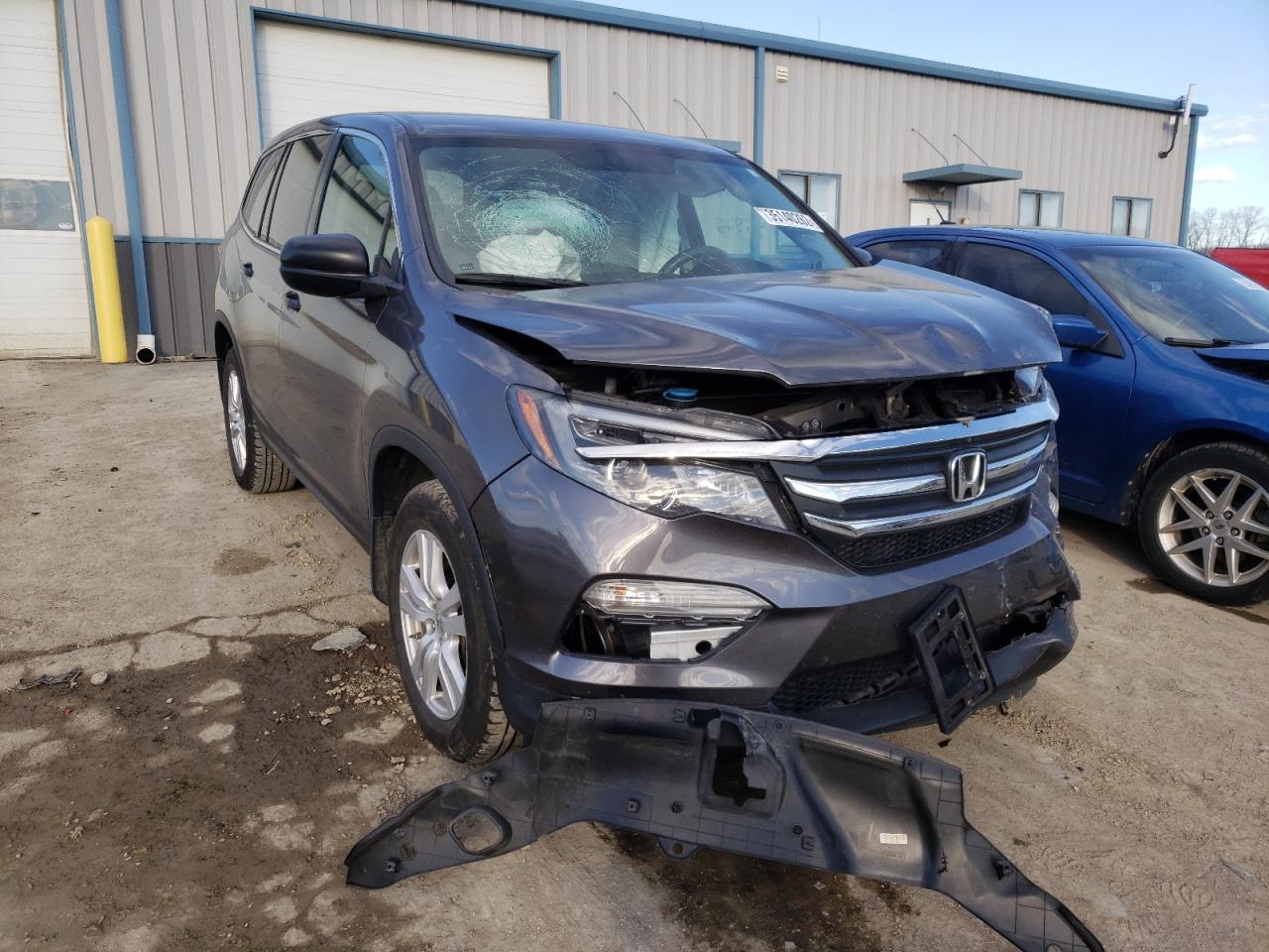 HONDA PILOT LX 2016 with VIN 5FNYF6H1XGB047906 - Photo from auction