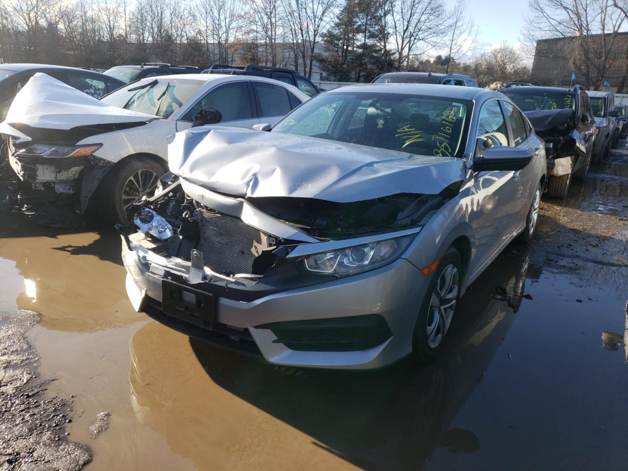 Photo 2 from auction – 2018 HONDA CIVIC LX with VIN 2HGFC2F59JH603334