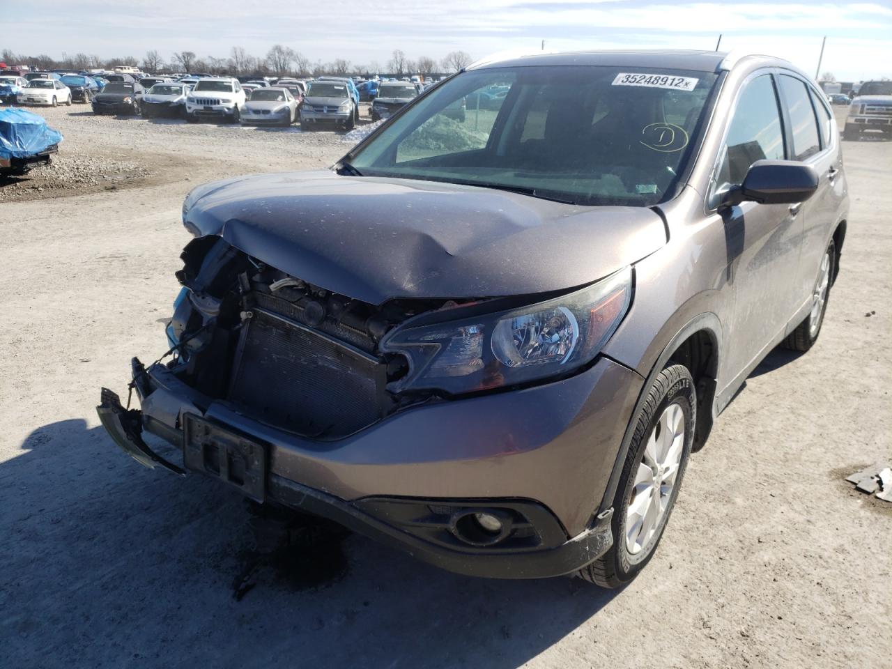Photo 2 from auction – 2013 HONDA CR-V EXL with VIN 5J6RM4H77DL070002