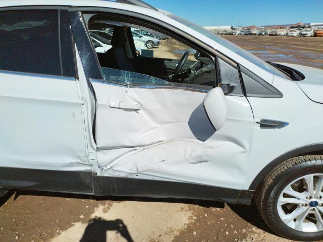 Photo 9 from auction – 2018 FORD ESCAPE SE with VIN 1FMCU9GD8JUC12875