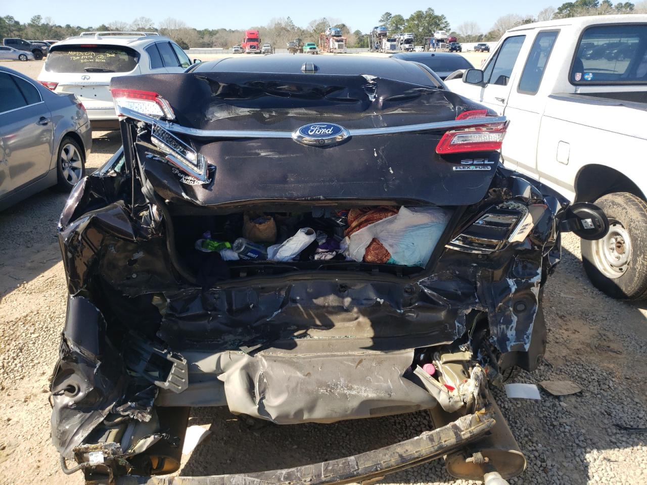 Photo 9 from auction – 2014 FORD TAURUS SEL with VIN 1FAHP2E80EG112830