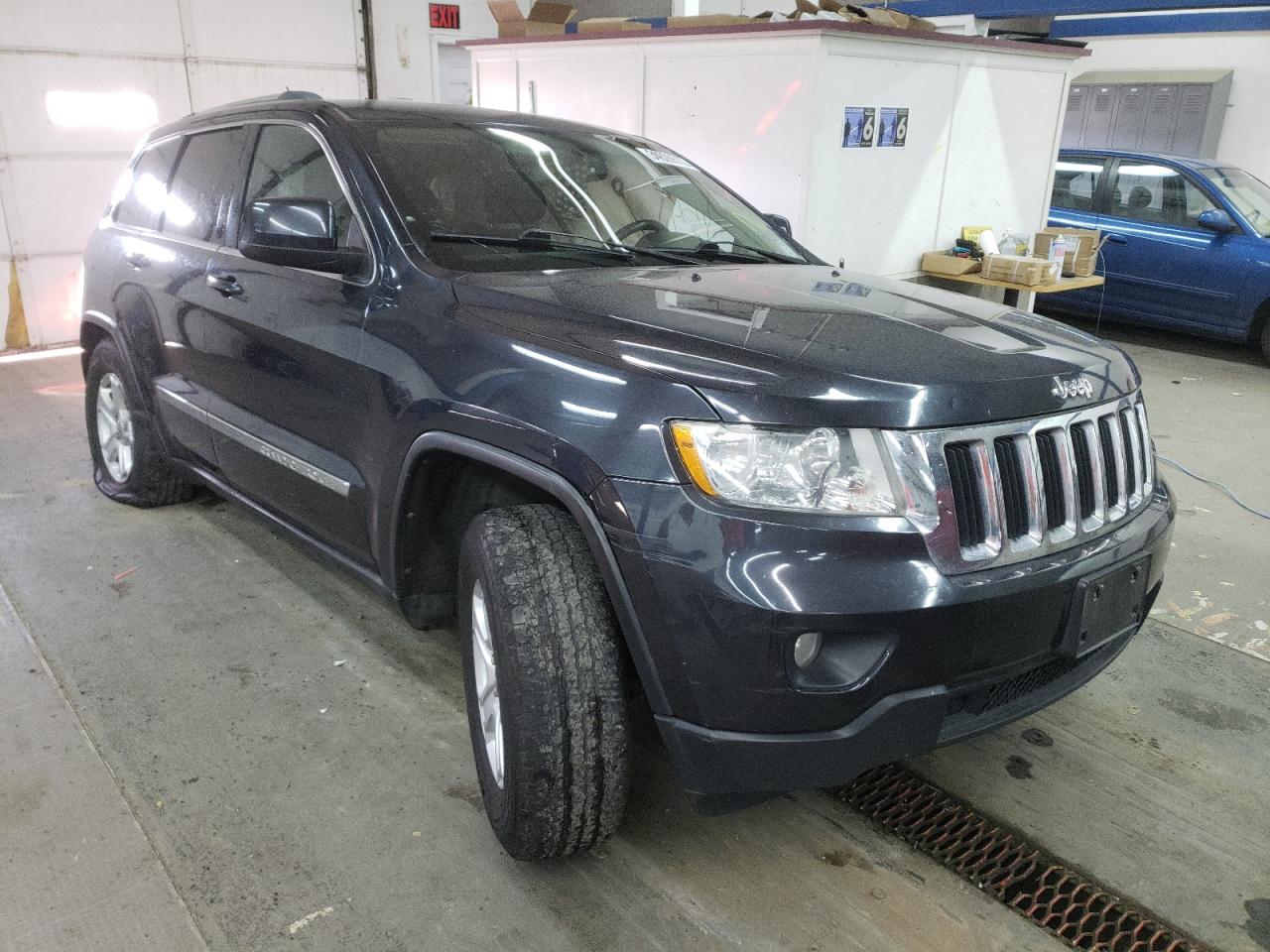JEEP GRAND CHER 2012 with VIN 1C4RJFAG1CC241877 - Photo from auction