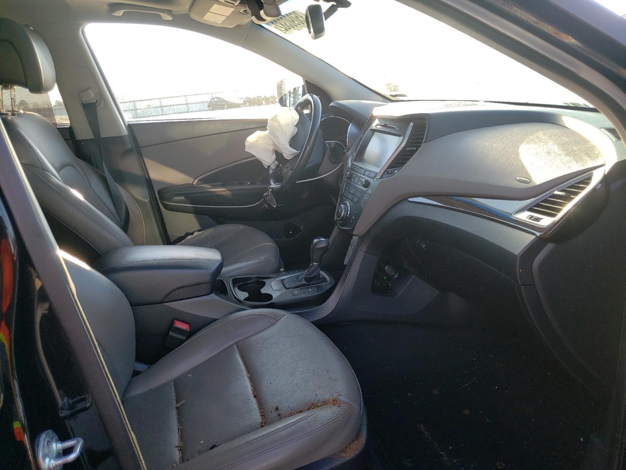 Photo 5 from auction – 2017 HYUNDAI SANTA FE S with VIN 5NMZU3LB8HH046438