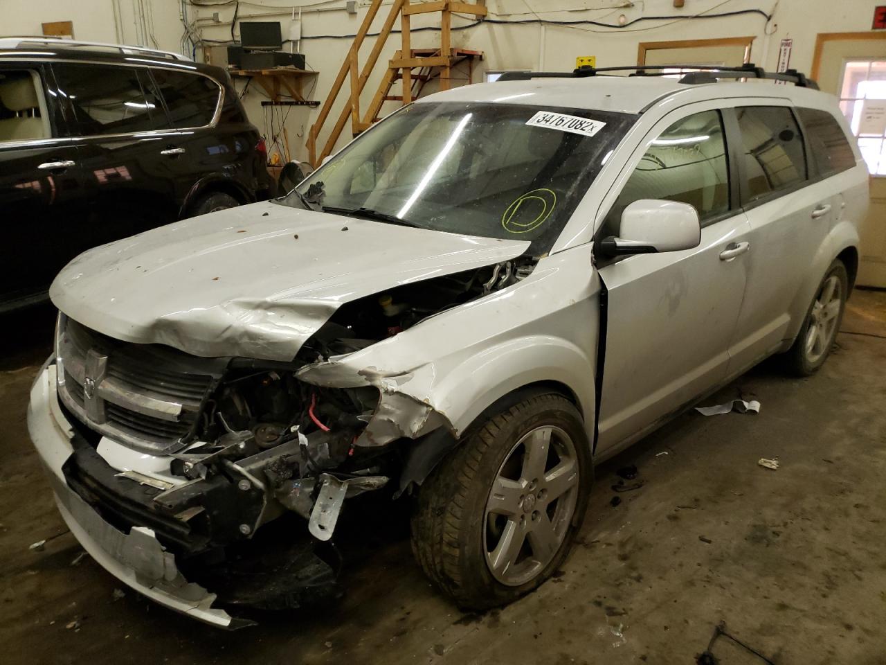 Photo 2 from auction – 2010 DODGE JOURNEY SX with VIN 3D4PH5FV3AT115402