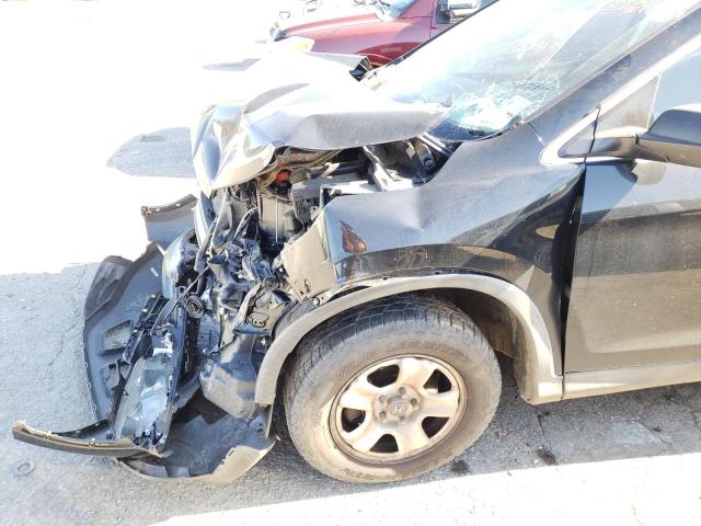 Photo 9 from auction – 2014 HONDA CR-V LX with VIN 3CZRM3H31EG716981