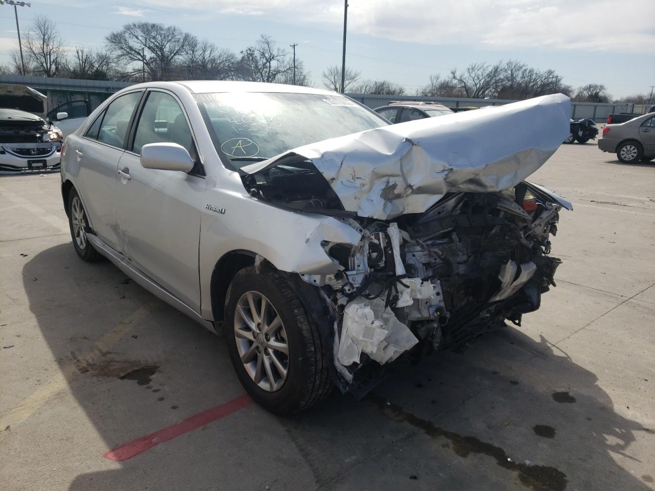 TOYOTA CAMRY HYBR 2011 with VIN 4T1BB3EK7BU139693 - Photo from auction