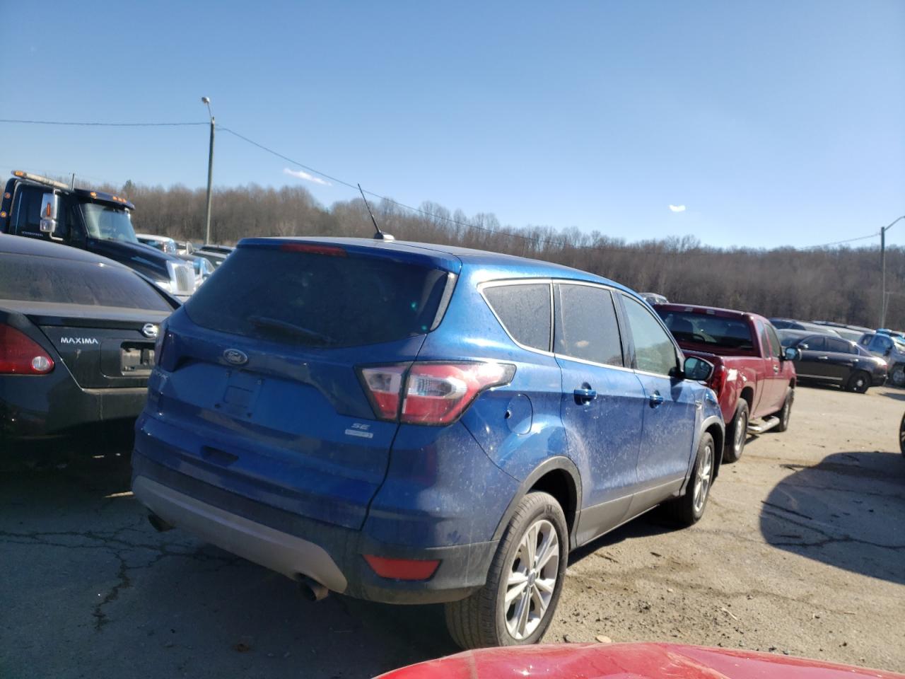 Photo 4 from auction – 2017 FORD ESCAPE SE with VIN 1FMCU0GD8HUD17731