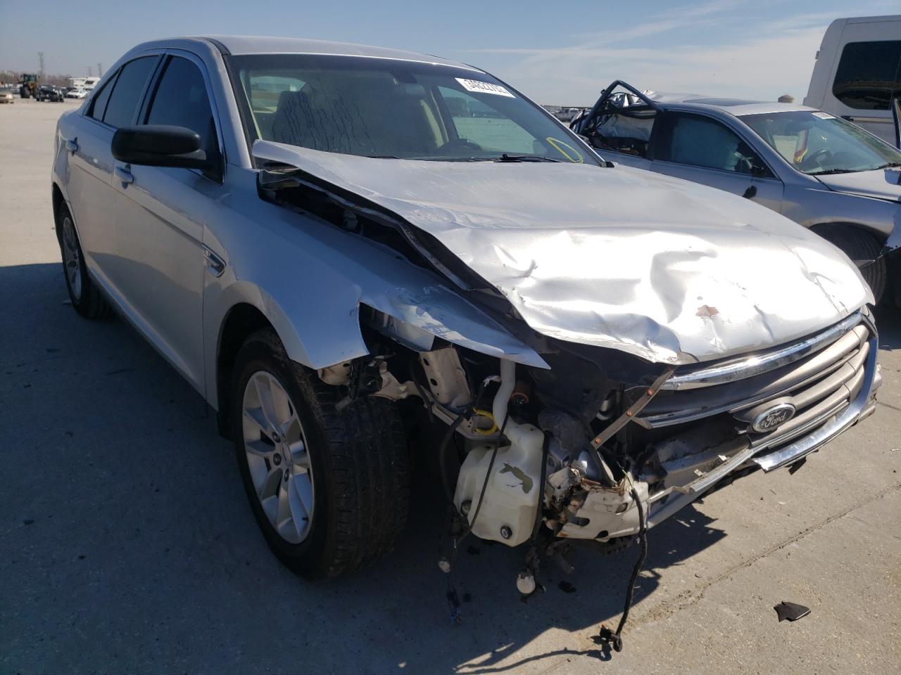 FORD TAURUS SE 2014 with VIN 1FAHP2D80EG107094 - Photo from auction