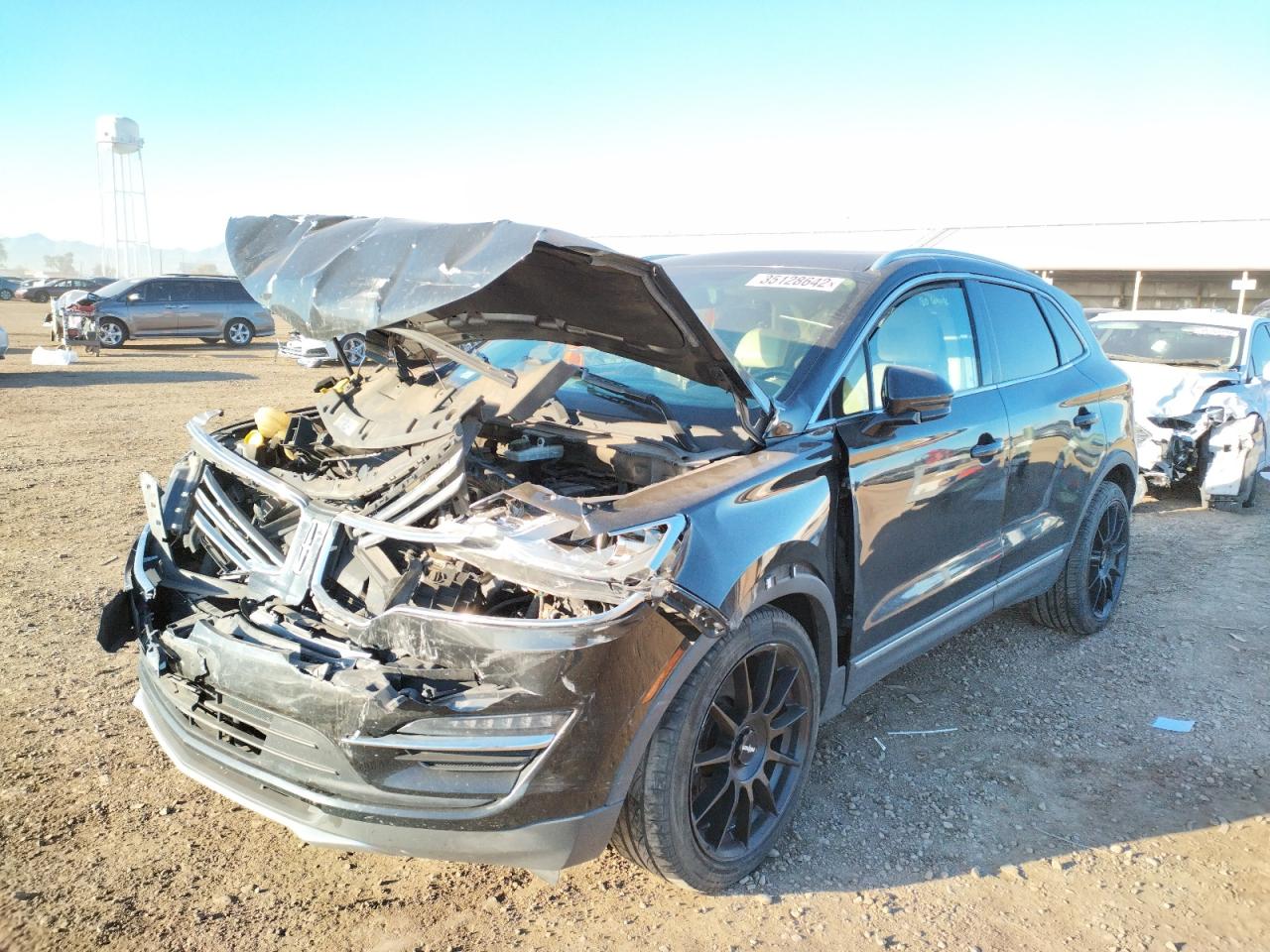 Photo 2 from auction – 2015 LINCOLN MKC with VIN 5LMCJ2A95FUJ01404