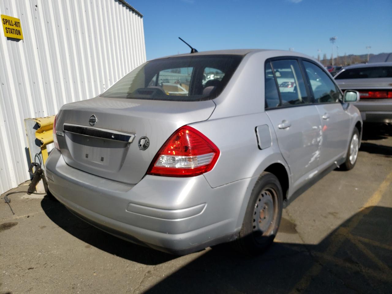 Photo 4 from auction – 2009 NISSAN VERSA with VIN 3N1BC11E19L400040