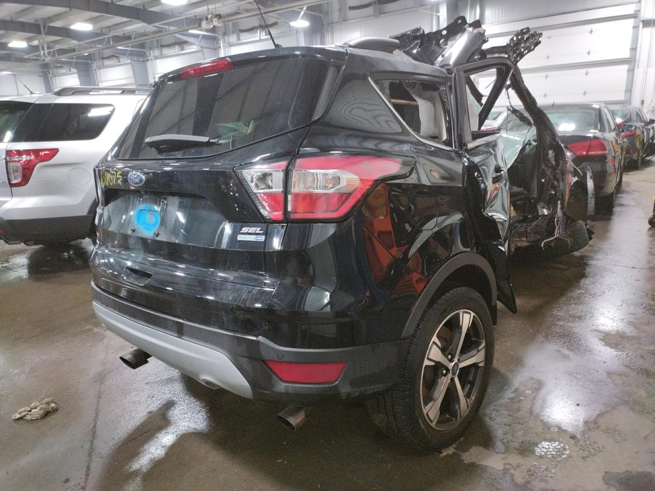 Photo 4 from auction – 2018 FORD ESCAPE SEL with VIN 1FMCU9HD1JUD50899