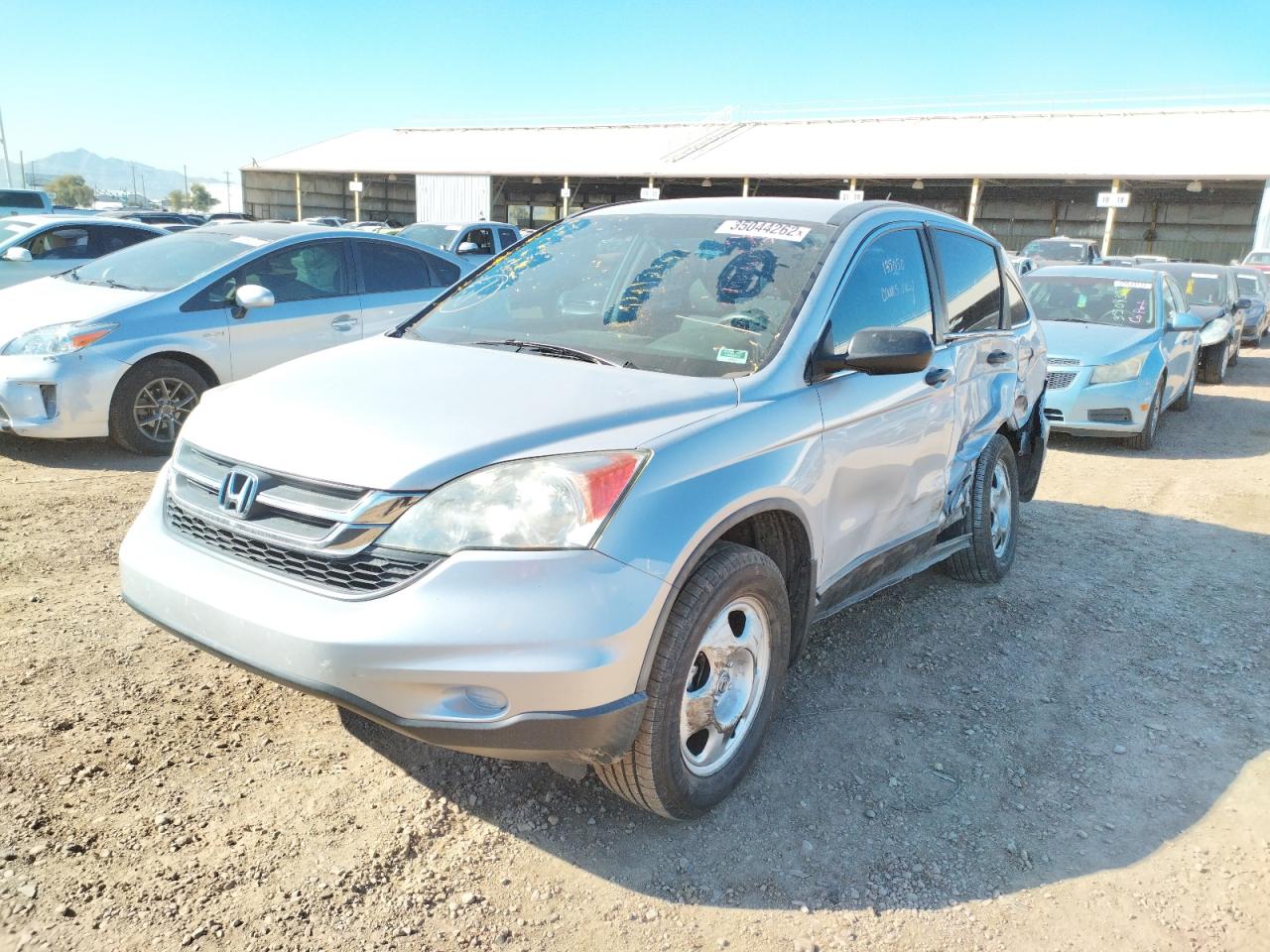 Photo 2 from auction – 2011 HONDA CR-V LX with VIN 5J6RE3H33BL050850