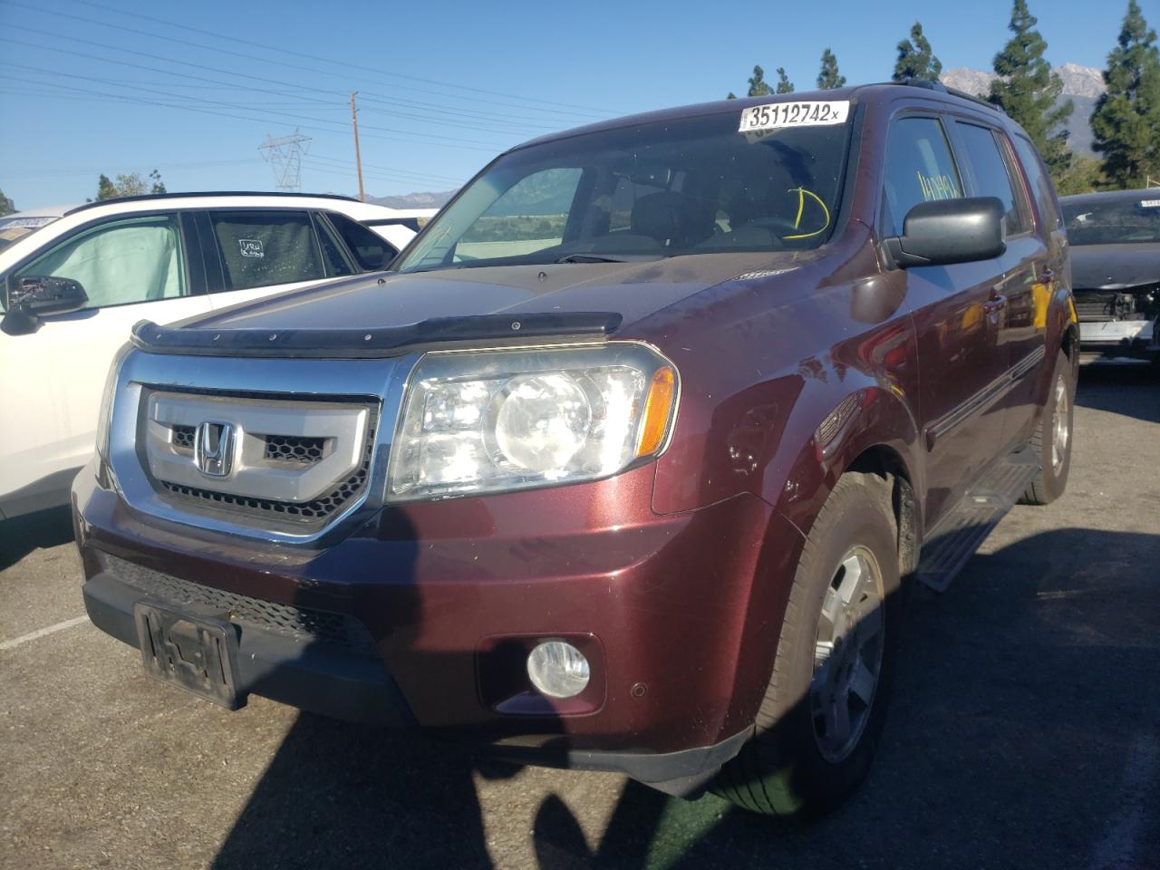 Photo 2 from auction – 2011 HONDA PILOT TOUR with VIN 5FNYF4H96BB031317