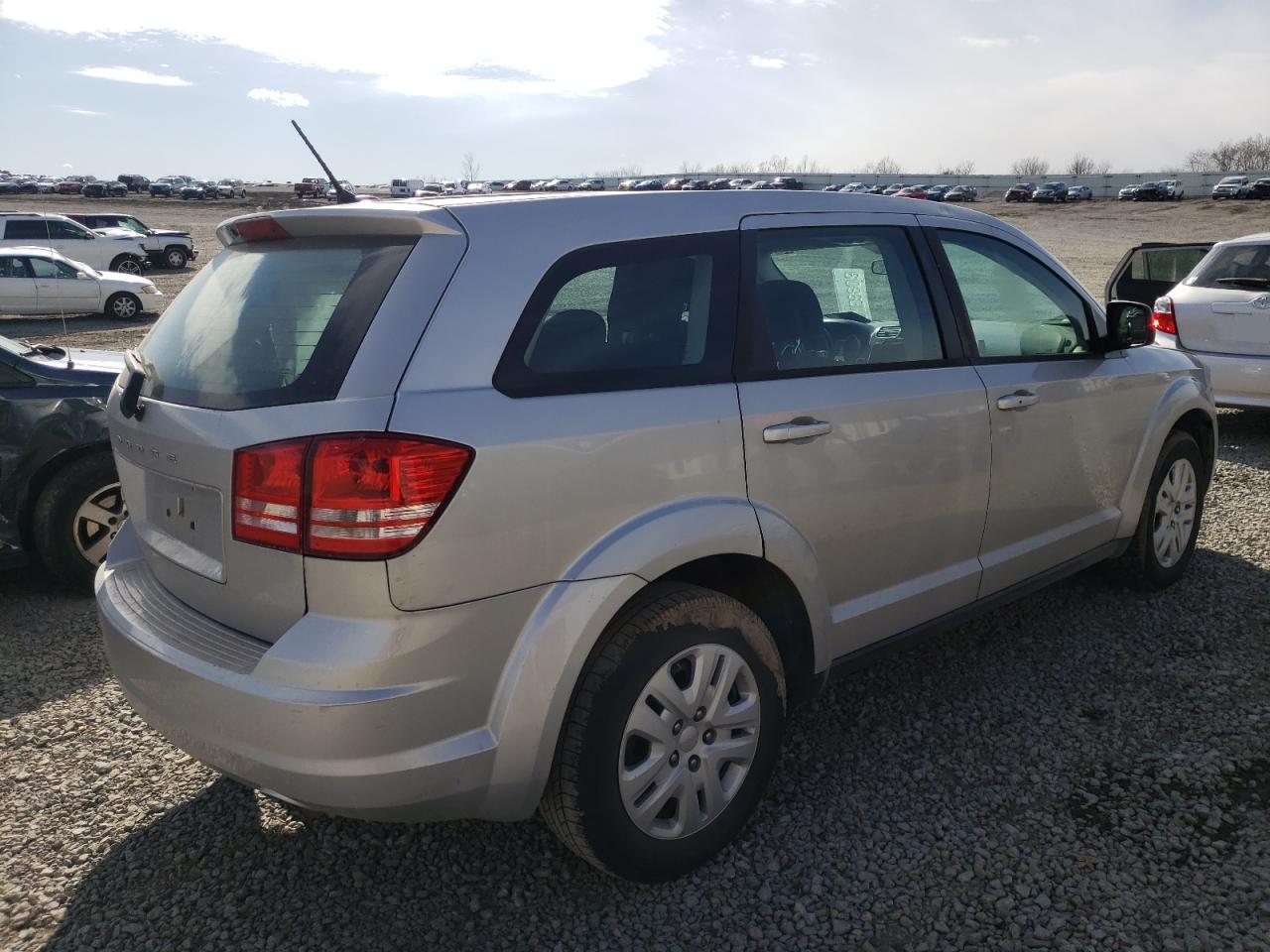 Photo 4 from auction – 2013 DODGE JOURNEY SE with VIN 3C4PDCAB7DT723096