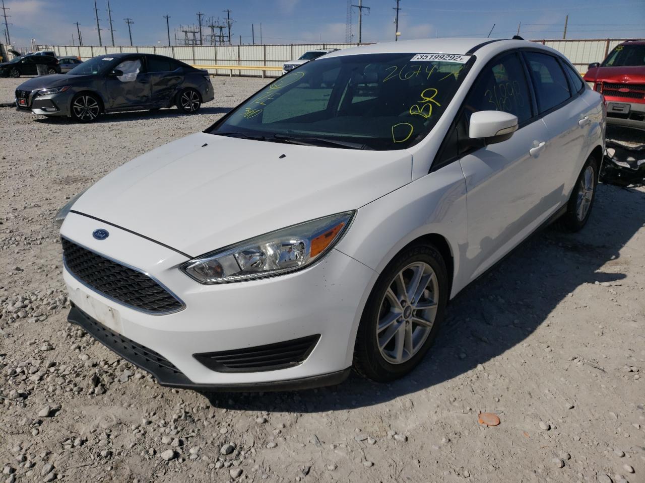 Photo 2 from auction – 2016 FORD FOCUS SE with VIN 1FADP3F20GL267452