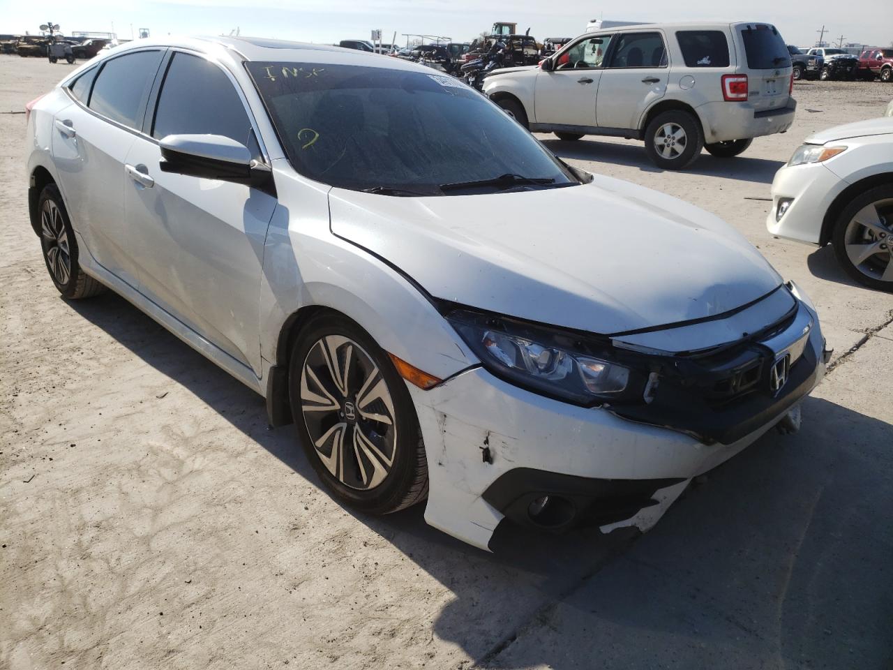 HONDA CIVIC EX 2017 with VIN 19XFC1F34HE029075 - Photo from auction