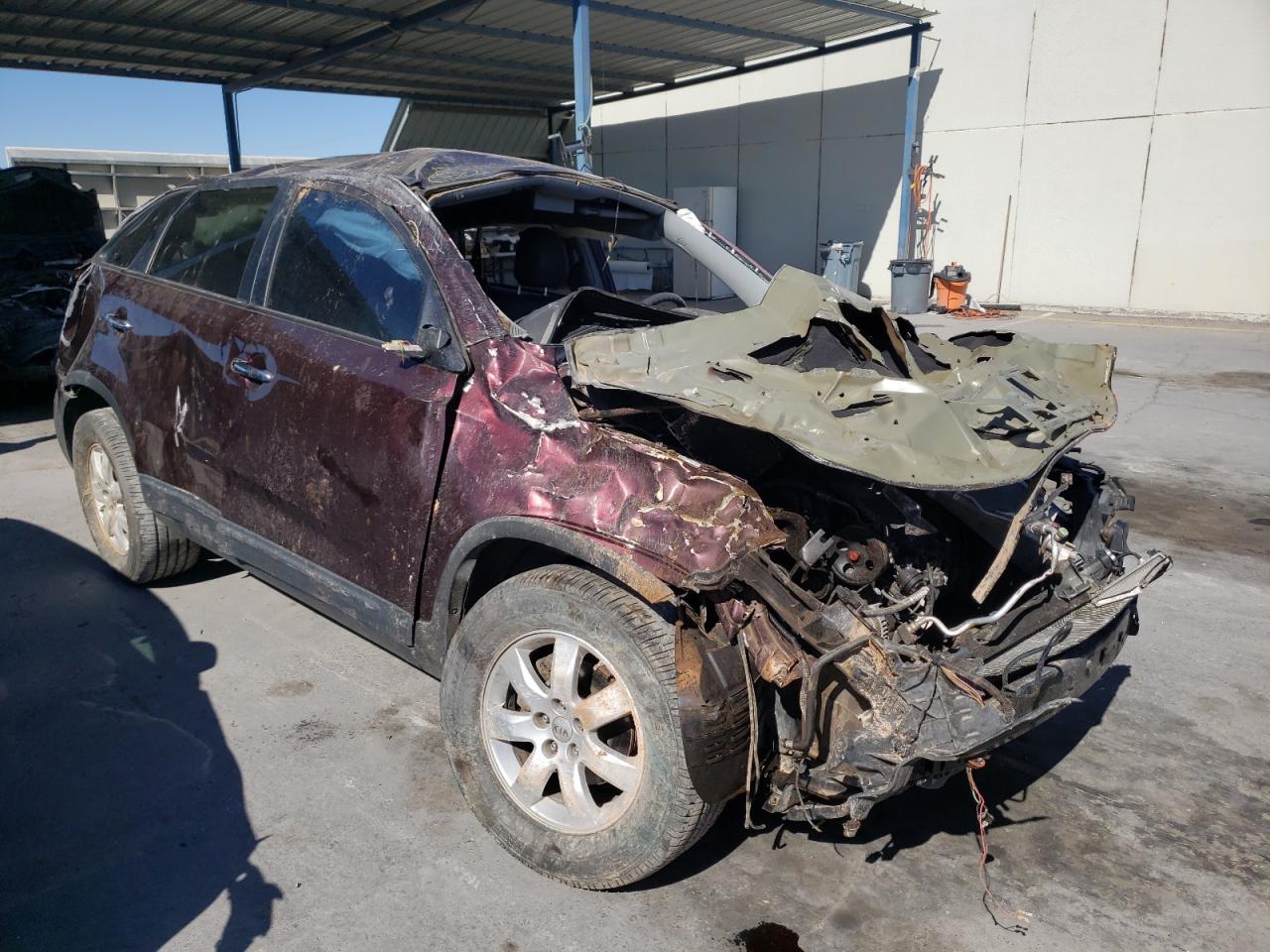 KIA SORENTO LX 2013 with VIN 5XYKT4A67DG339168 - Photo from auction