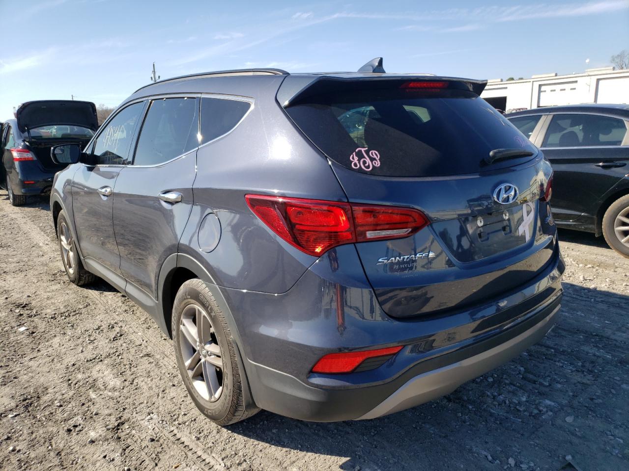 Photo 3 from auction – 2017 HYUNDAI SANTA FE with VIN 5NMZU3LB0HH019914