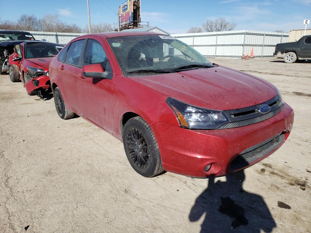 FORD FOCUS SES 2010 with VIN 1FAHP3GN0AW209793 - Photo from auction