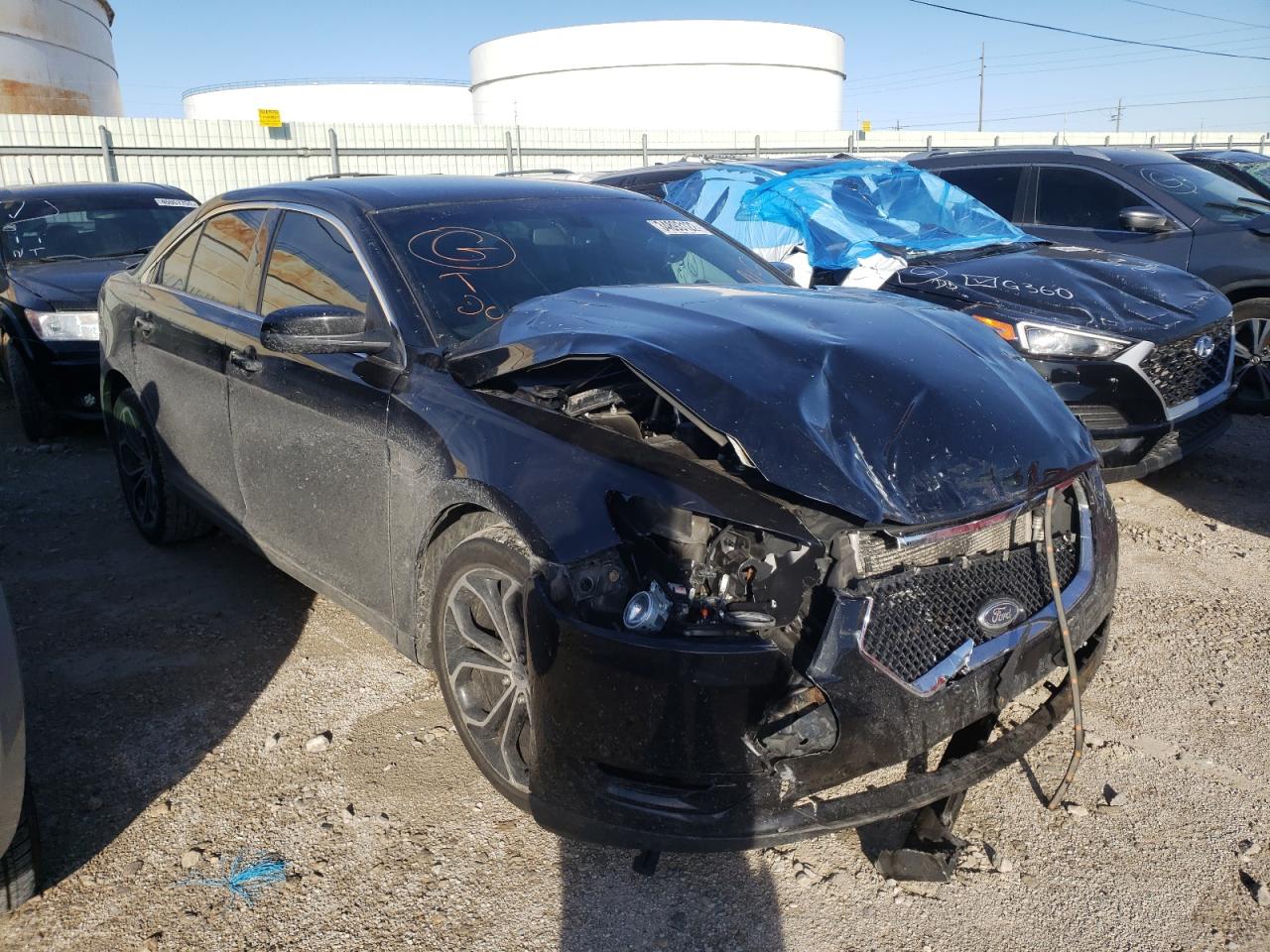 FORD TAURUS SHO 2014 with VIN 1FAHP2KT0EG183695 - Photo from auction