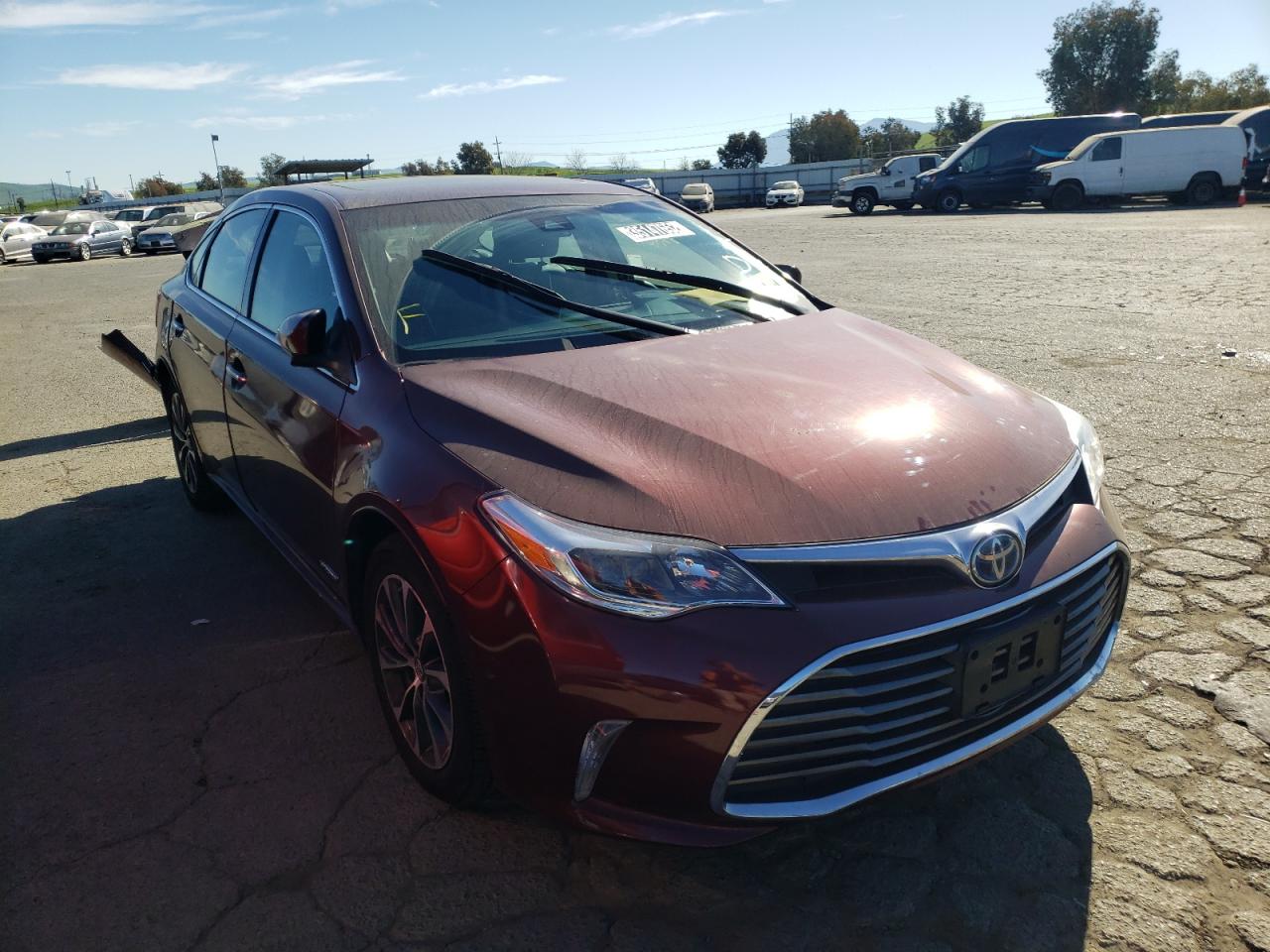 TOYOTA AVALON HYB 2018 with VIN 4T1BD1EB7JU060439 - Photo from auction
