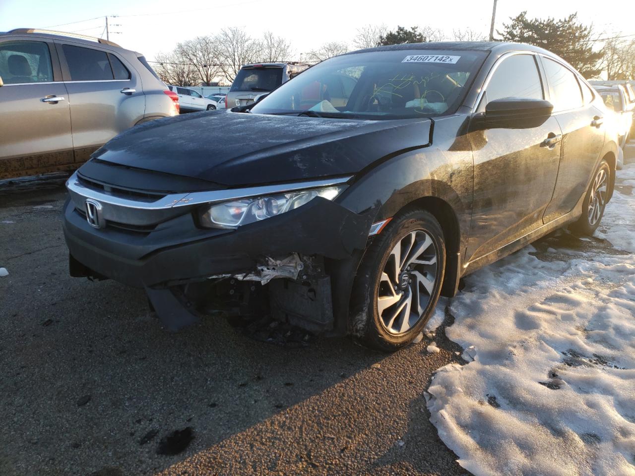 Photo 2 from auction – 2016 HONDA CIVIC EX with VIN 19XFC2F73GE080168